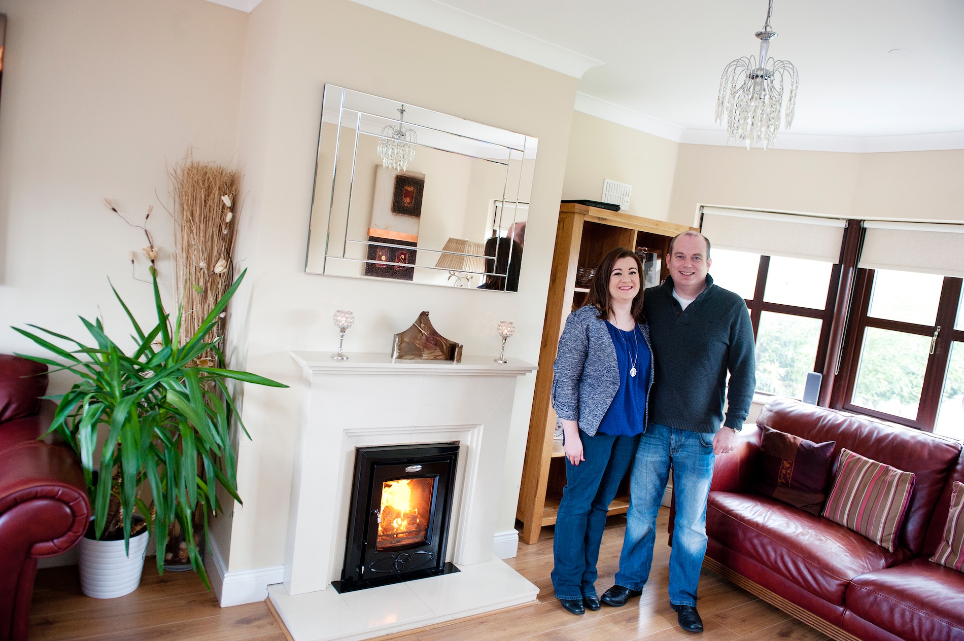 Carol and Randall O'Connor and their Cara Insert and Oisin stove